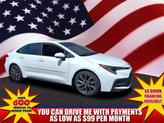 Photo of 2022 White w/Black Sand Pearl Roof Toyota Corolla