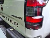 Thumbnail of 2023 Glacier White Nissan Frontier