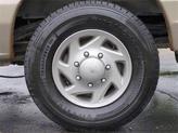 Thumbnail of 2014 Pueblo Gold Metallic Ford E250