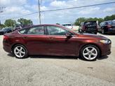 Thumbnail of 2015 Ruby Red Tinted Clearcoat Ford Fusion