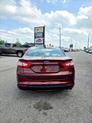 Thumbnail of 2015 Ruby Red Tinted Clearcoat Ford Fusion