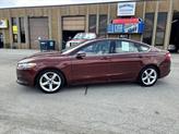 Thumbnail of 2015 Ruby Red Tinted Clearcoat Ford Fusion