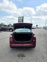 Thumbnail of 2015 Ruby Red Tinted Clearcoat Ford Fusion