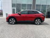 Thumbnail of 2025 Aurora Red Chroma With Black Roof Volkswagen ID.4