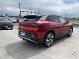 Thumbnail of 2025 Aurora Red Chroma With Black Roof Volkswagen ID.4