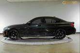 Thumbnail of 2024 Black Sapphire Metallic BMW 330