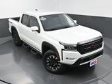 Thumbnail of 2023 Glacier White Nissan Frontier