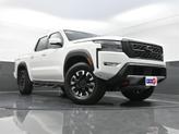 Thumbnail of 2023 Glacier White Nissan Frontier