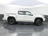 Thumbnail of 2023 Glacier White Nissan Frontier