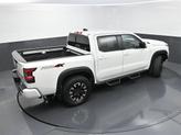 Thumbnail of 2023 Glacier White Nissan Frontier
