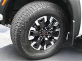 Thumbnail of 2023 Glacier White Nissan Frontier