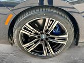 Thumbnail of 2023 Carbon Black Metallic BMW 740