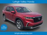 Photo of 2025 Radiant Red Metallic II Honda Pilot