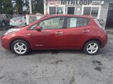 Photo of 2012 Cayenne Red Nissan Leaf