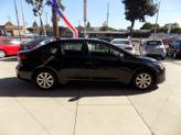 Thumbnail of 2024 Midnight Black Metallic Toyota Corolla