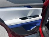 Thumbnail of 2025 Radiant Red Tintcoat Cadillac OPTIQ