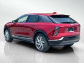 Thumbnail of 2025 Radiant Red Tintcoat Cadillac OPTIQ