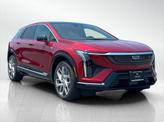 Photo of 2025 Radiant Red Tintcoat Cadillac OPTIQ
