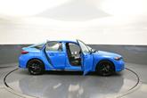 Thumbnail of 2025 Boost Blue Pearl Honda Civic Hybrid