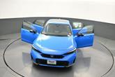 Thumbnail of 2025 Boost Blue Pearl Honda Civic Hybrid