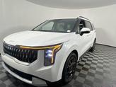 Thumbnail of 2026 Snow White Pearl Kia Carnival Hybrid