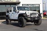 Thumbnail of 2010 Stone White Clearcoat Jeep Wrangler Unlimited