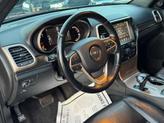 Thumbnail of 2015 Deep Cherry Red Crystal Pearlcoat Jeep Grand Cherokee