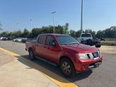 Thumbnail of 2013 Lava Red Nissan Frontier