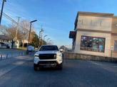 Thumbnail of 2023 Glacier White Nissan Frontier