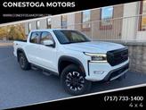 Photo of 2023 Glacier White Nissan Frontier