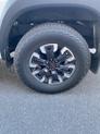 Thumbnail of 2023 Glacier White Nissan Frontier
