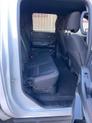 Thumbnail of 2023 Glacier White Nissan Frontier