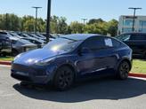 Thumbnail of 2024 Deep Blue Metallic Tesla Model Y