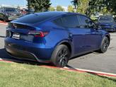 Thumbnail of 2024 Deep Blue Metallic Tesla Model Y