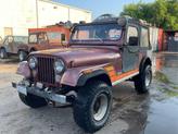 Photo of 1984 Burgundy Jeep CJ-7