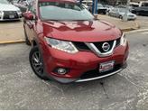 Photo of 2015 Cayenne Red Nissan Rogue