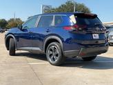 Thumbnail of 2024 Deep Ocean Blue Pearl Nissan Rogue
