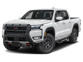 Photo of 2025 Glacier White Nissan Frontier