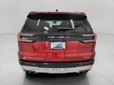 Thumbnail of 2024 Volcanic Red Tintcoat GMC Acadia