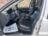 Thumbnail of 2004 Stone White Clearcoat Jeep Grand Cherokee