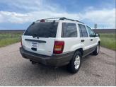 Thumbnail of 2004 Stone White Clearcoat Jeep Grand Cherokee