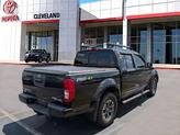 Thumbnail of 2016 Magnetic Black Nissan Frontier