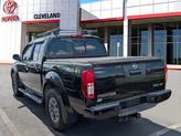 Thumbnail of 2016 Magnetic Black Nissan Frontier