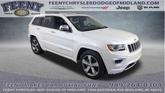 Photo of 2016 Ivory Jeep Grand Cherokee