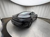 Thumbnail of 2023 Jet Black Metallic Porsche Taycan