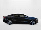 Thumbnail of 2013 Tuxedo Black Metallic Ford Fusion