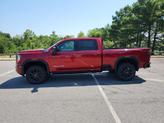 Thumbnail of 2025 Volcanic Red Tintcoat GMC Sierra 2500