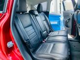 Thumbnail of 2013 Ruby Red Metallic Tinted Clearcoat Ford C-Max Hybrid