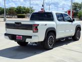 Thumbnail of 2025 Glacier White Nissan Frontier