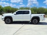 Thumbnail of 2025 Glacier White Nissan Frontier